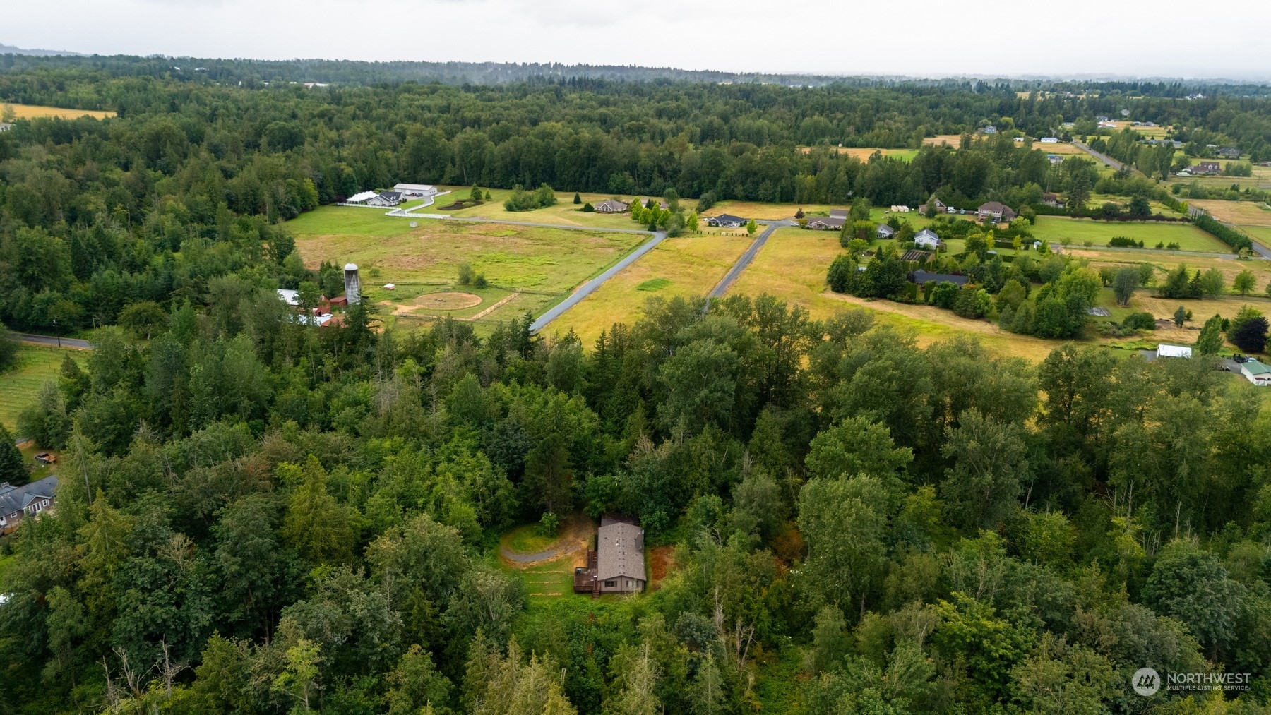 5656 Starry Road Bellingham, WA 98226 - Photo 1 of 25 a view of a lake with a yard