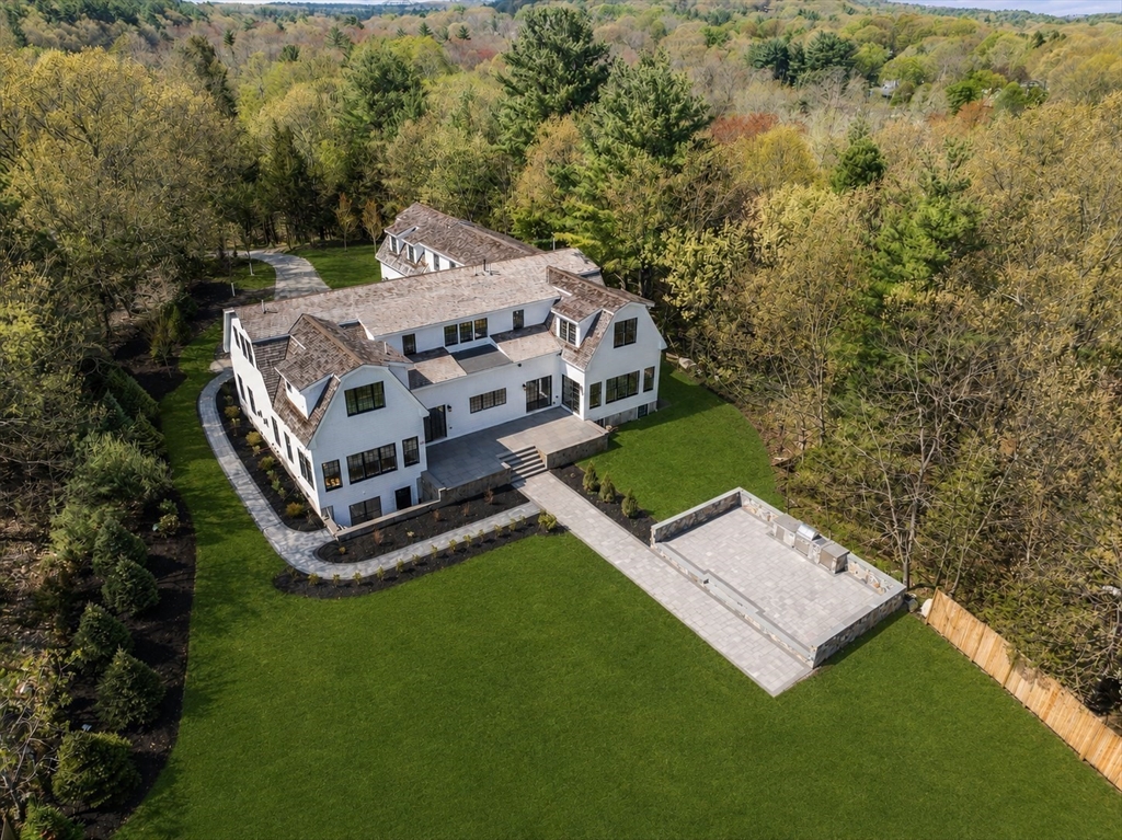 10 Hitching Post Lane Weston, MA 02493 - Photo 2 of 42 an aerial view of a house with backyard