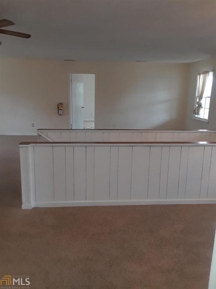 995 Green Street Southeast, Unit C Conyers, GA 30012 - Photo 6 of 29 a view of a garage