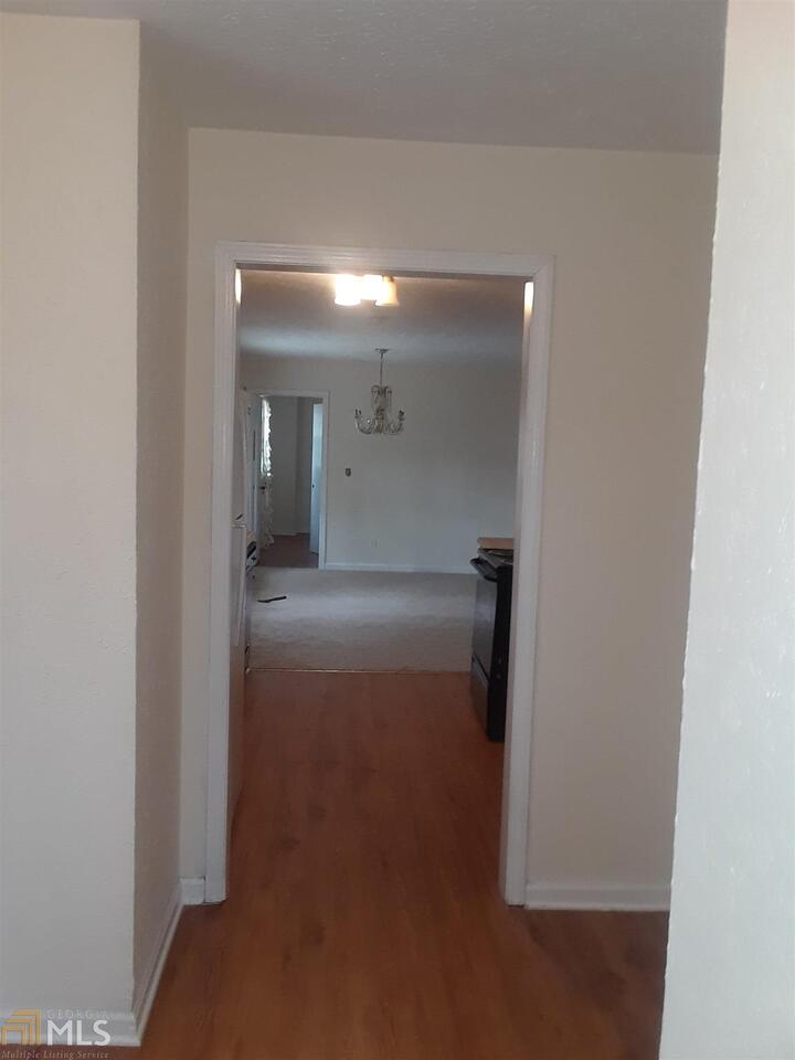 995 Green Street Southeast, Unit C Conyers, GA 30012 - Photo 10 of 29 a view of a hallway