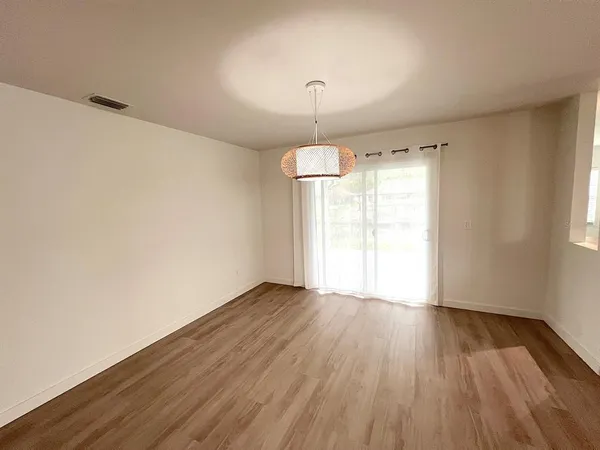 a kitchen with a stove and a sink