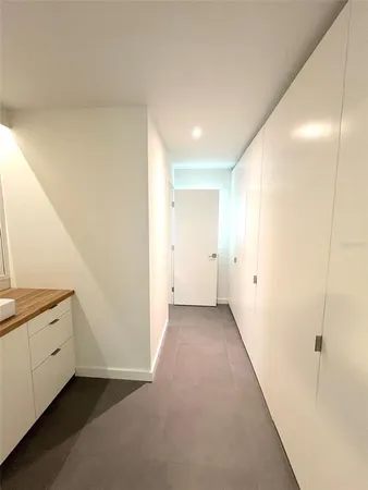 a bathroom with a toilet and shower