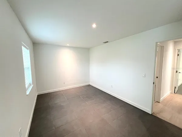 a view of a swimming pool and a porch