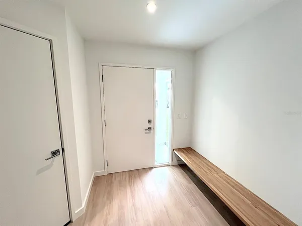 a view of a kitchen from the hallway