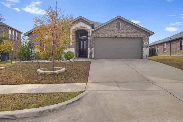 a front view of a house with entertaining space