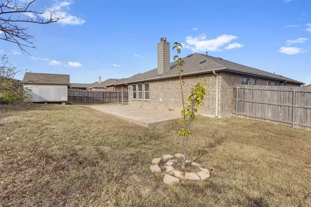 a view of a house with a patio