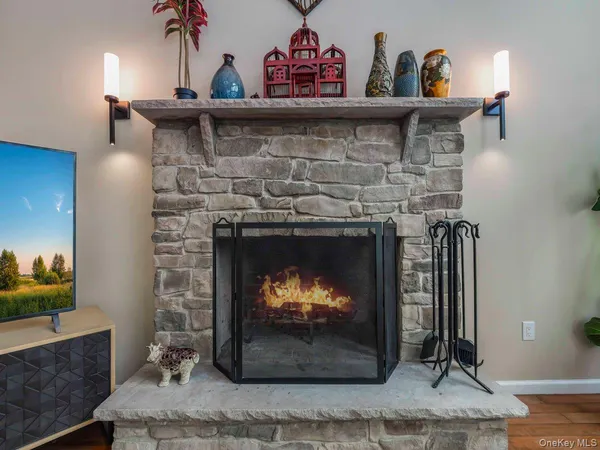 a fireplace with a clock on top of it