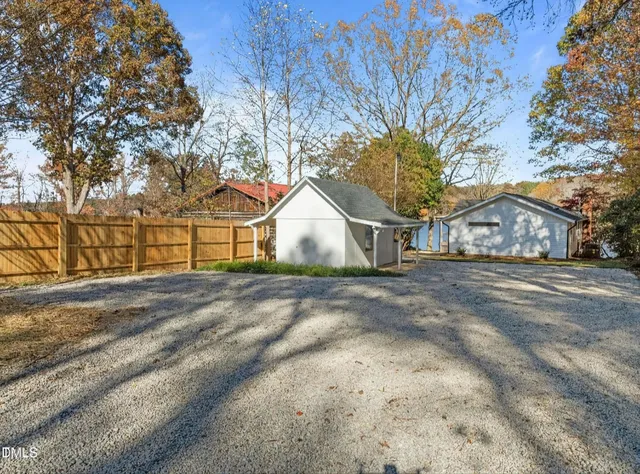 a kitchen with a sink cabinets and window