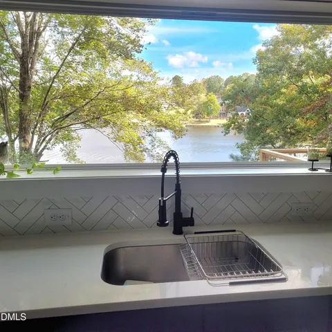 wooden floor with a fireplace in it