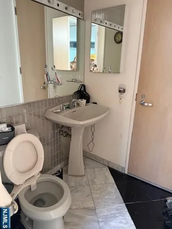 a close view of a sink and a stove in a room