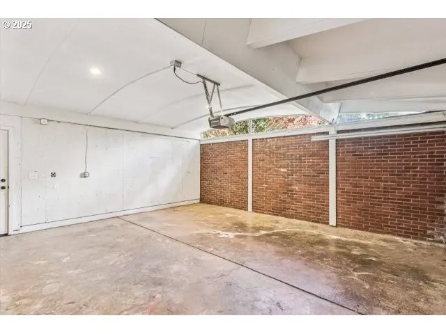 a view of a room with wooden walls