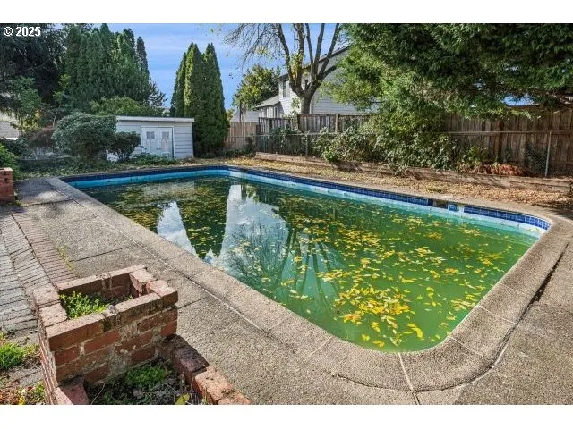 a view of swimming pool from a balcony
