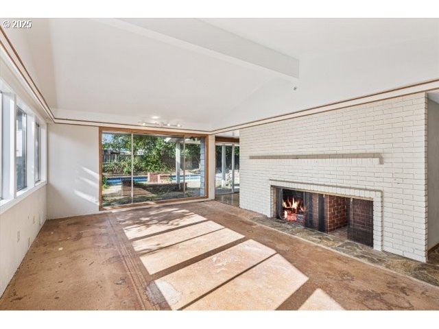 215 Southwest Towle Avenue Gresham, OR 97080 - Photo 6 of 38 a living room with furniture and a fireplace