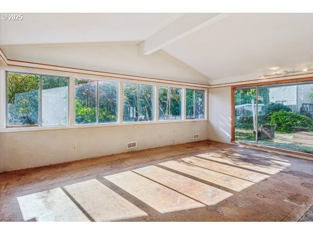 215 Southwest Towle Avenue Gresham, OR 97080 - Photo 9 of 38 a view of an empty room with wooden floor and a window