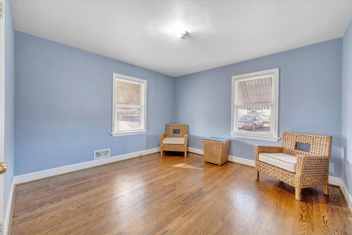 3808 Cove Road Roanoke, VA 24017 - Photo 16 of 34 a living room with furniture and wooden floor