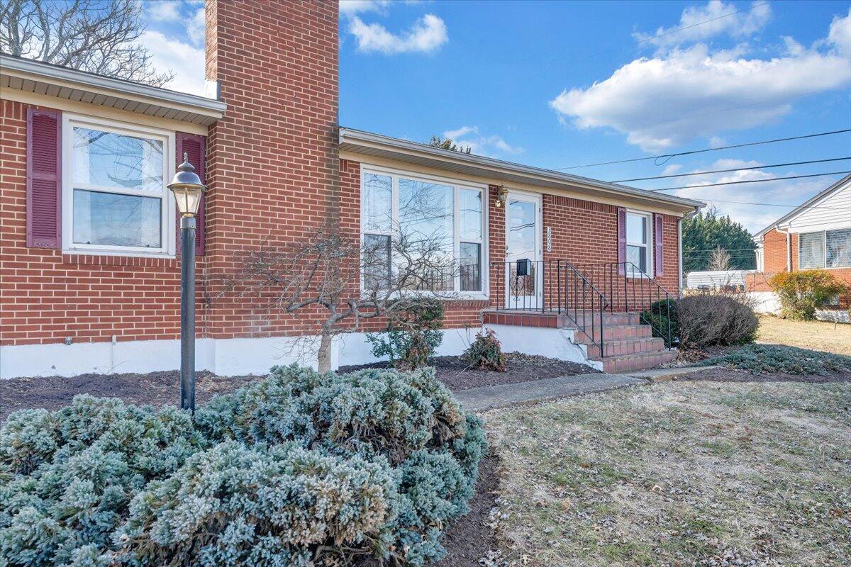 3808 Cove Road Roanoke, VA 24017 - Photo 2 of 34 a view of a house with backyard and porch