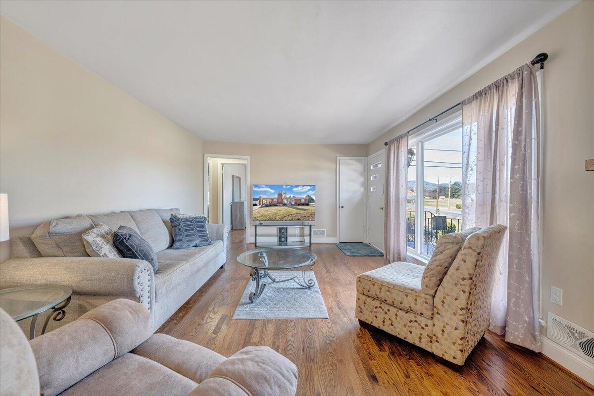 3808 Cove Road Roanoke, VA 24017 - Photo 6 of 34 a living room with furniture and a large window