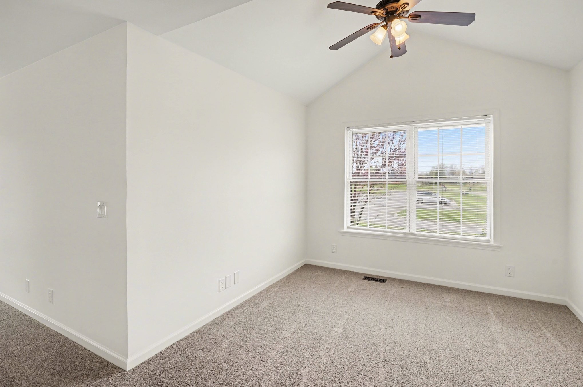 161 Fieldstone Lane Springfield, TN 37172 - Photo 12 of 26 an empty room with a window and a fan