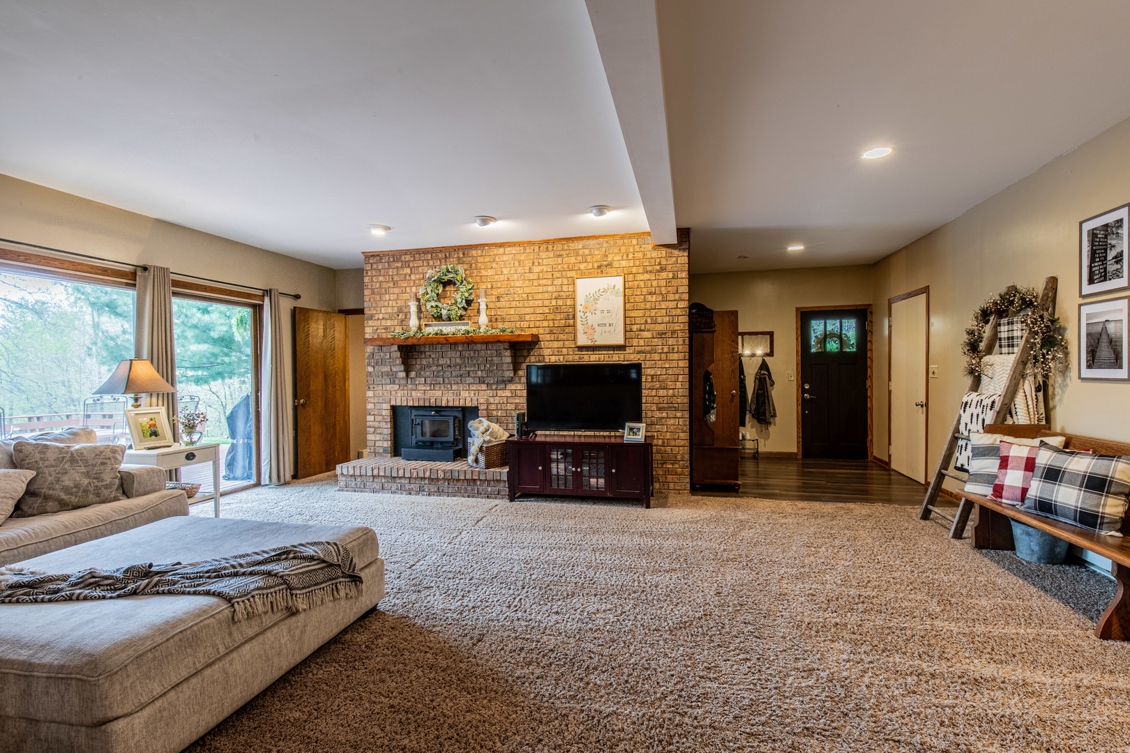 1000 Timber Ridge Road Princeton, IL 61356 - Photo 14 of 55 a living room with furniture and a flat screen tv