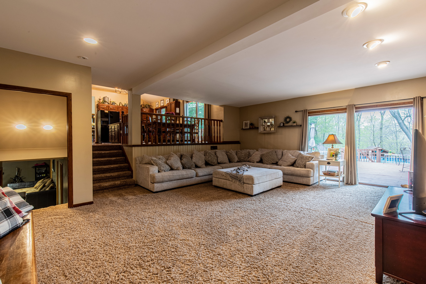 1000 Timber Ridge Road Princeton, IL 61356 - Photo 15 of 55 a living room with furniture and a flat screen tv