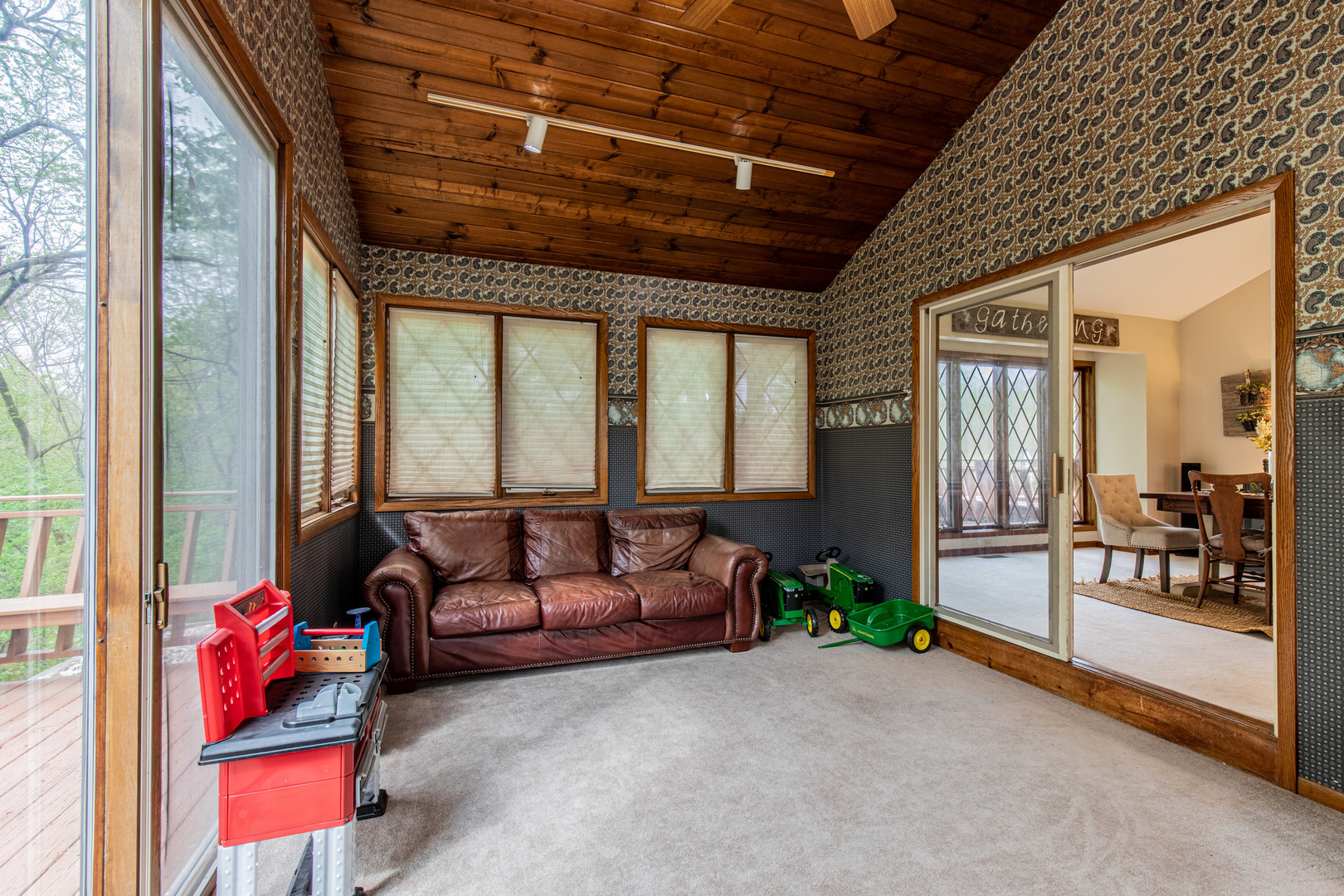 1000 Timber Ridge Road Princeton, IL 61356 - Photo 18 of 55 a living room with furniture and a floor to ceiling window