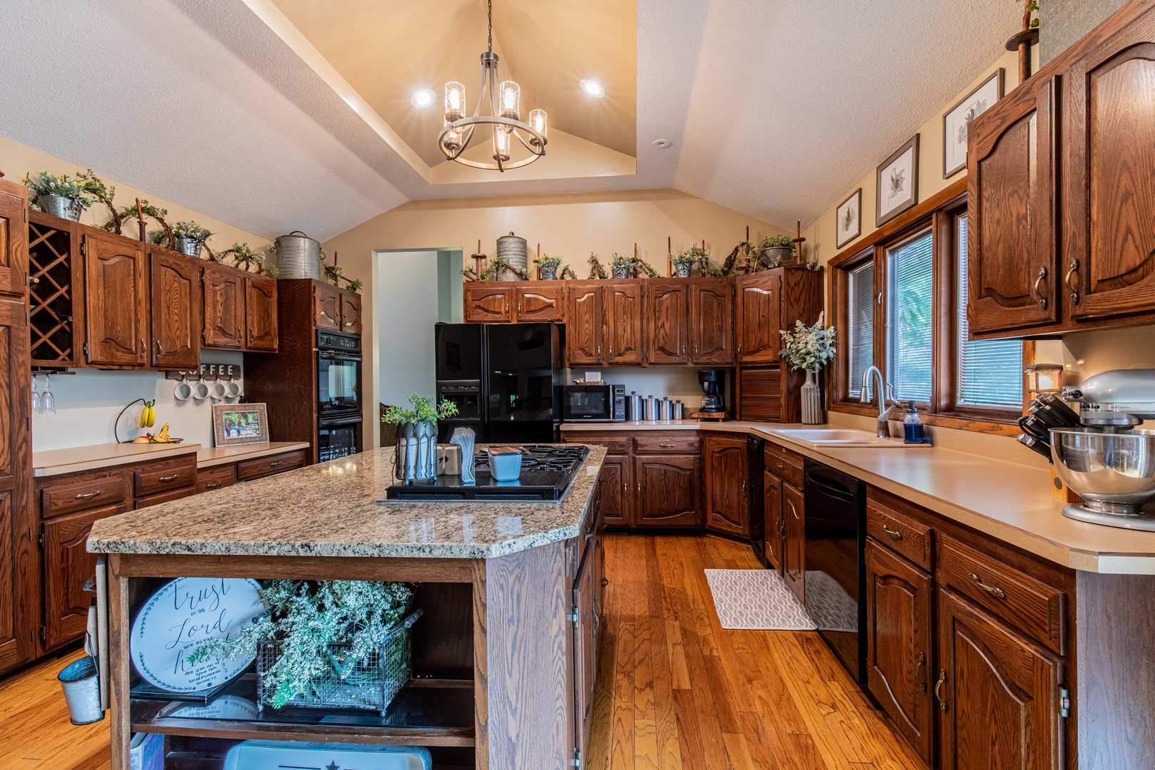 1000 Timber Ridge Road Princeton, IL 61356 - Photo 20 of 55 a kitchen with stainless steel appliances granite countertop a stove and cabinets