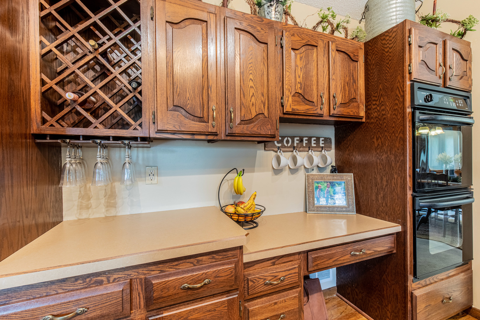 1000 Timber Ridge Road Princeton, IL 61356 - Photo 22 of 55 a kitchen with a sink a stove and cabinets