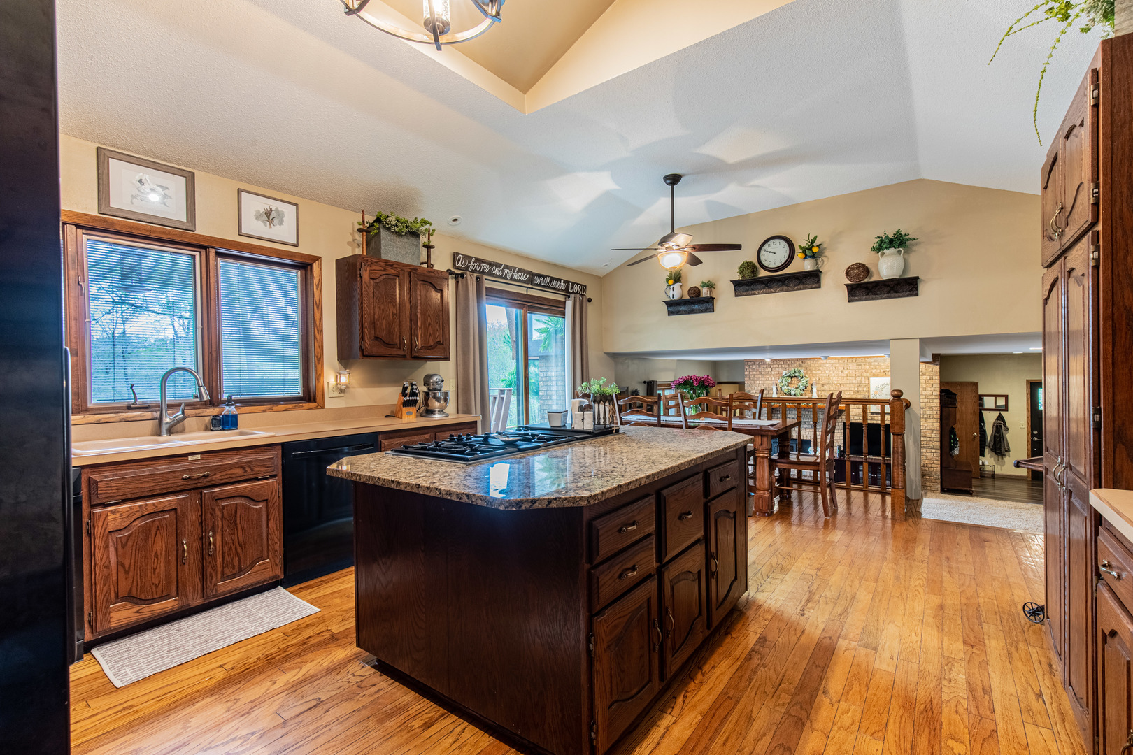 1000 Timber Ridge Road Princeton, IL 61356 - Photo 23 of 55 a kitchen with stainless steel appliances granite countertop a stove and a wooden floors