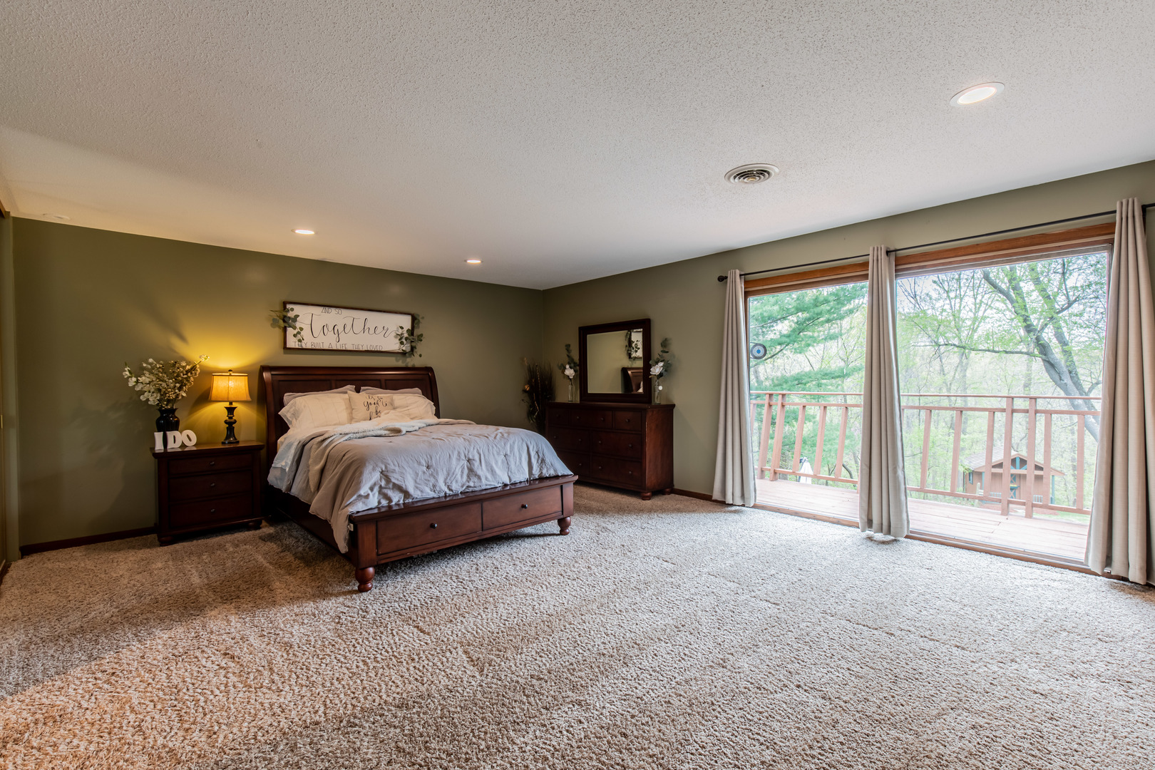 1000 Timber Ridge Road Princeton, IL 61356 - Photo 29 of 55 a bedroom with a bed and large window