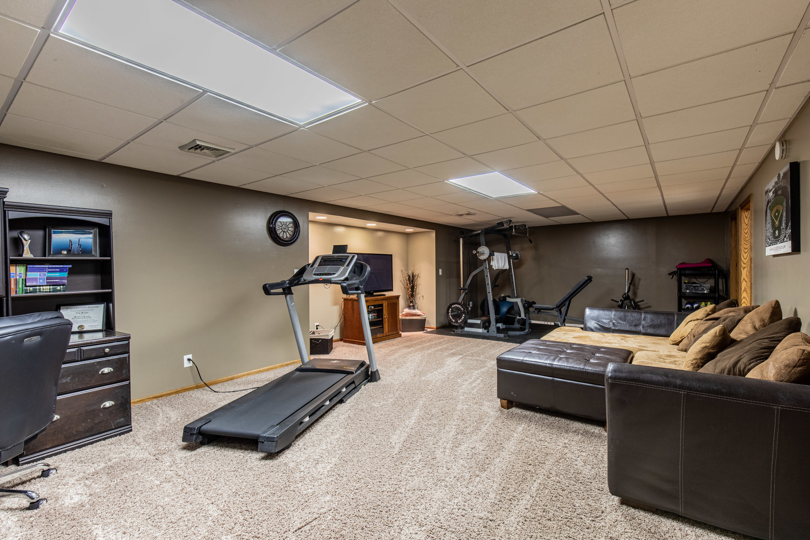 1000 Timber Ridge Road Princeton, IL 61356 - Photo 39 of 55 a bed room with furniture and a flat screen tv