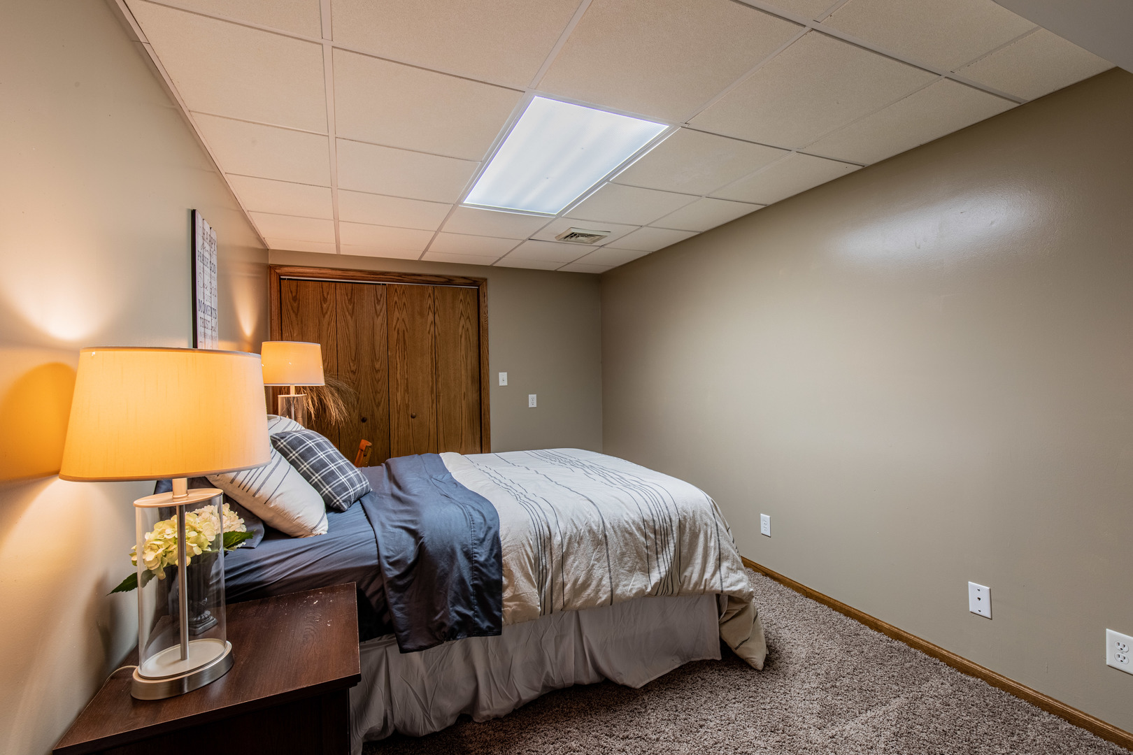 1000 Timber Ridge Road Princeton, IL 61356 - Photo 42 of 55 a bedroom with a bed and lamp