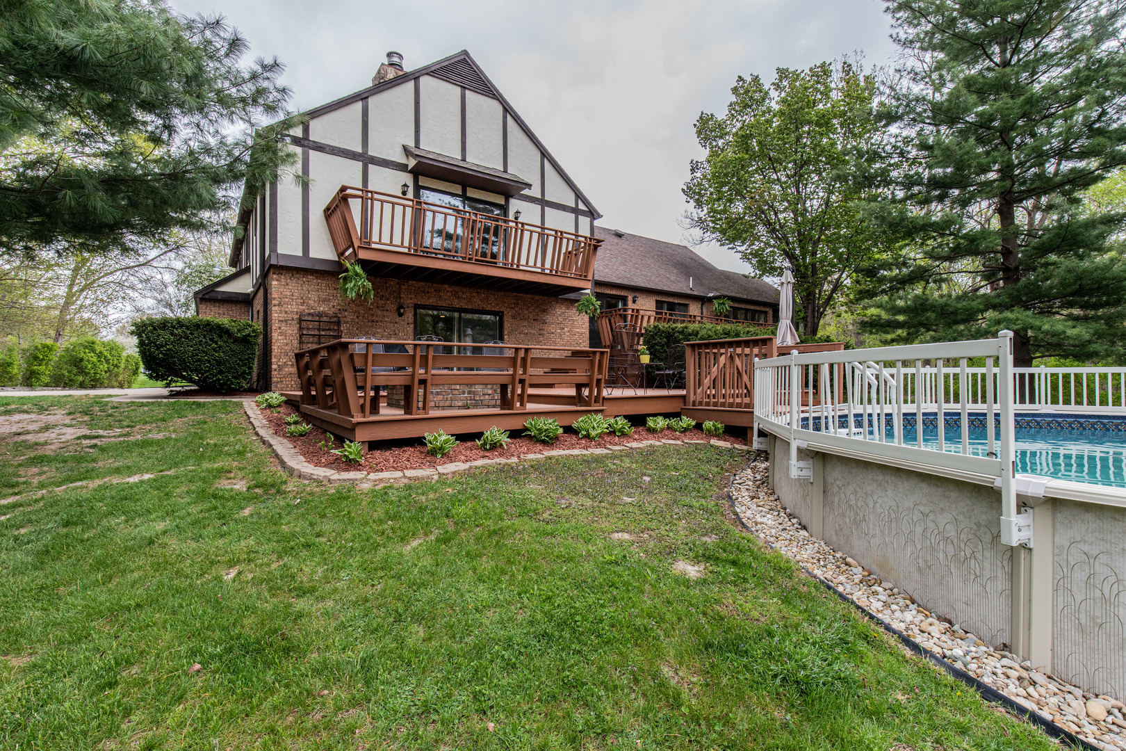 1000 Timber Ridge Road Princeton, IL 61356 - Photo 44 of 55 a view of a house with a yard and a wooden deck