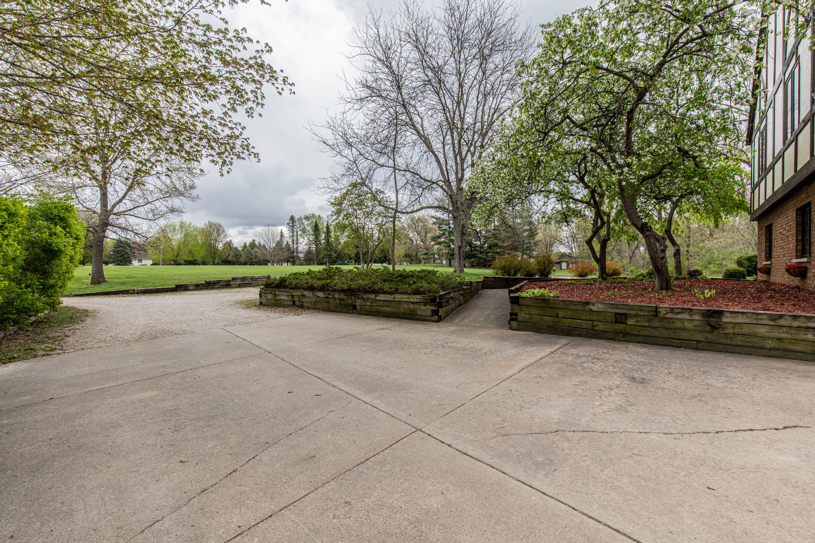 1000 Timber Ridge Road Princeton, IL 61356 - Photo 8 of 55 a view of a street with a bench and trees