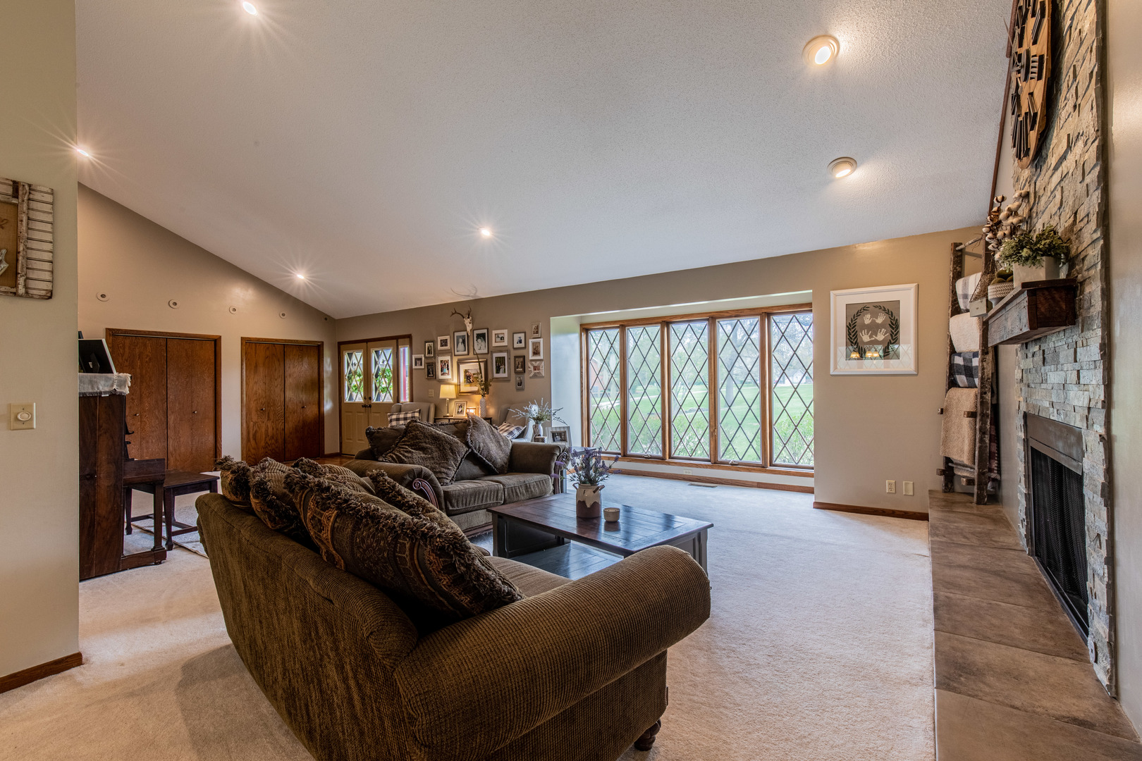 1000 Timber Ridge Road Princeton, IL 61356 - Photo 10 of 55 a living room with furniture and a fireplace