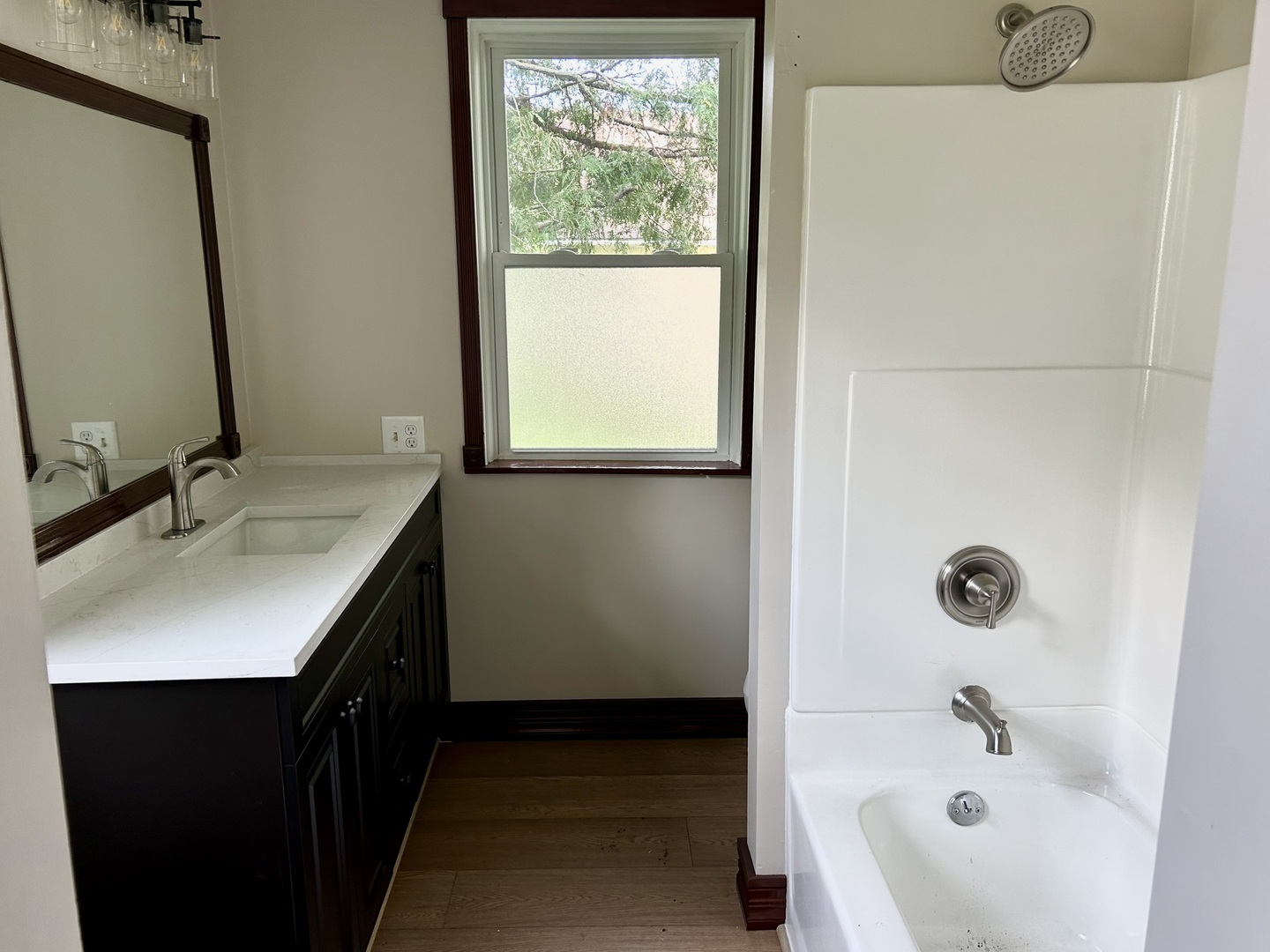 109 South Bureau Avenue Ladd, IL 61329 - Photo 13 of 23 a bathroom with a tub sink and mirror