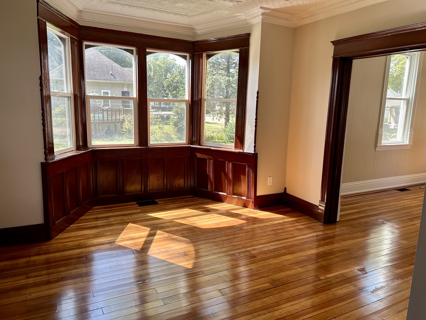 109 South Bureau Avenue Ladd, IL 61329 - Photo 6 of 23 a view of a room with wooden floor and a window