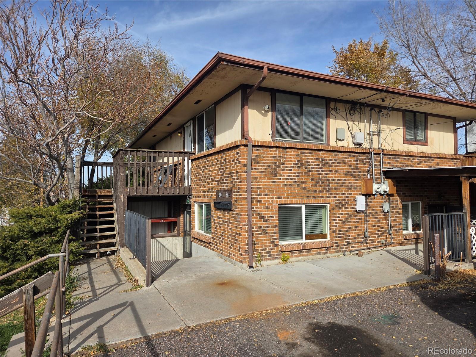 a front view of a house with a garage