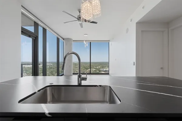a kitchen with a sink and a window