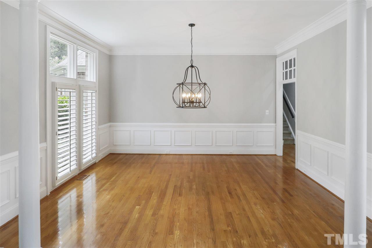 512 Pendleton Lake Road Raleigh, NC 27614 - Photo 2 of 30 a view of a room with wooden floor water heater and windows