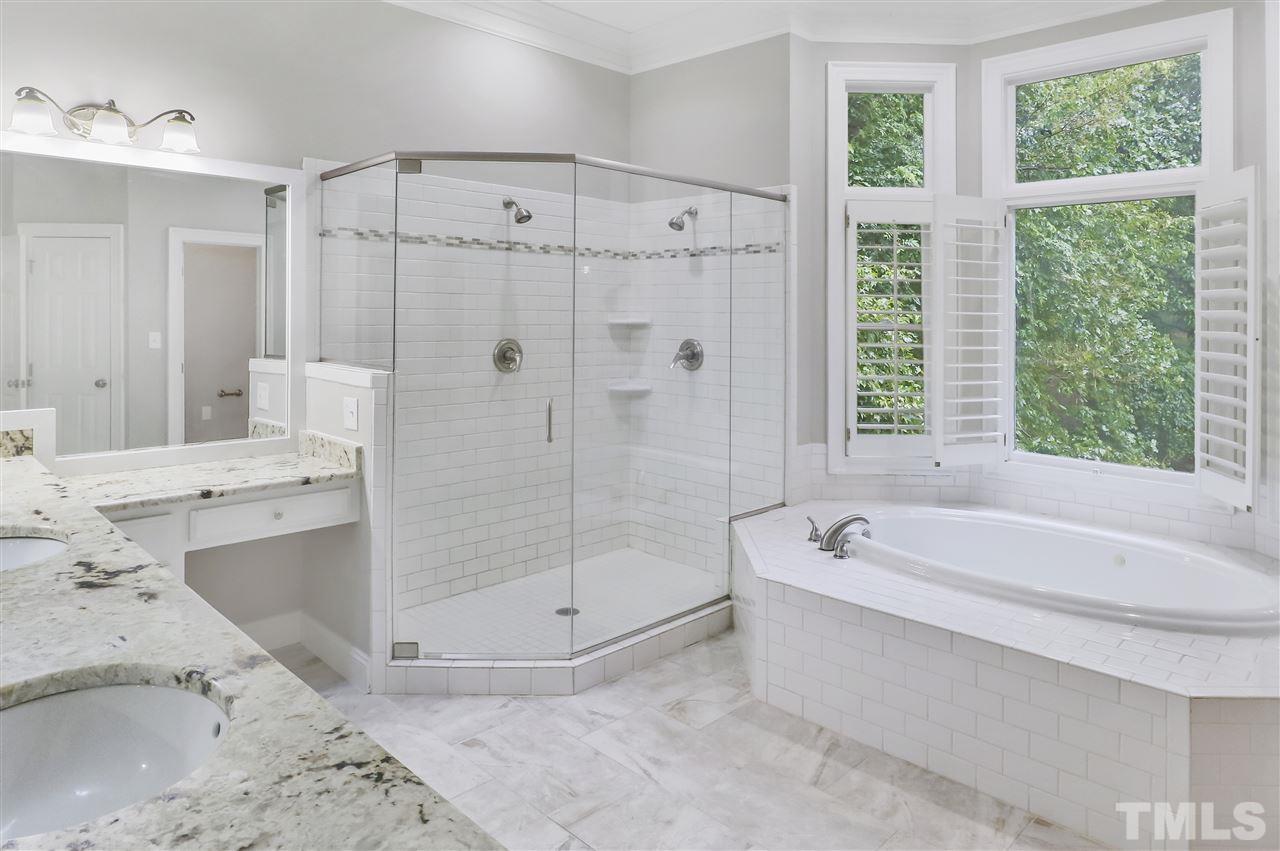 512 Pendleton Lake Road Raleigh, NC 27614 - Photo 13 of 30 a bathroom with a tub a sink and a shower