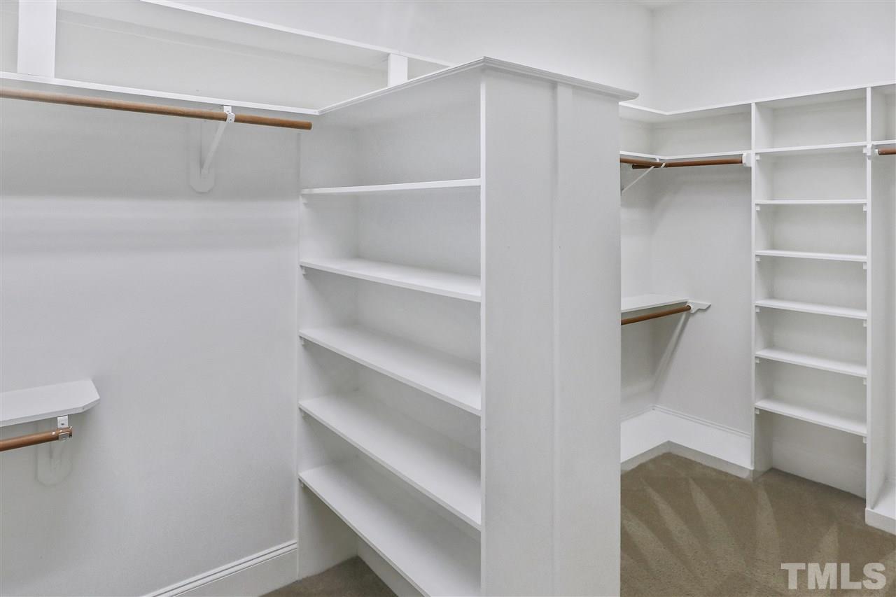 512 Pendleton Lake Road Raleigh, NC 27614 - Photo 15 of 30 a view of walk in closet with empty racks