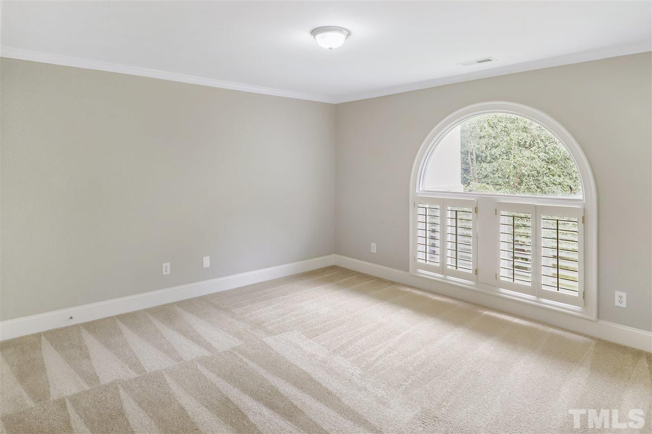 512 Pendleton Lake Road Raleigh, NC 27614 - Photo 16 of 30 an empty room with a fireplace