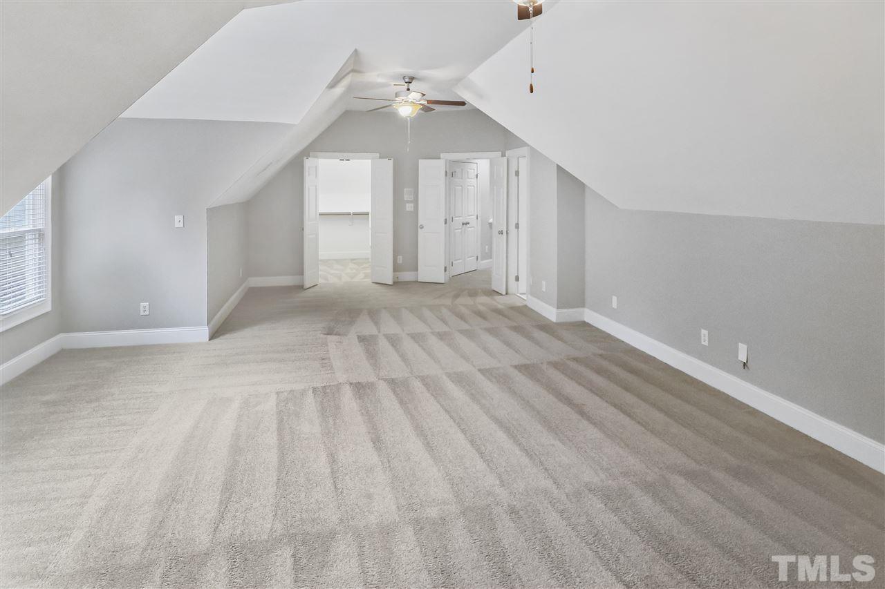 512 Pendleton Lake Road Raleigh, NC 27614 - Photo 17 of 30 a view of an empty room with a fireplace