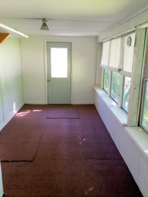 24 Cushman Road Winslow, ME 04901 - Photo 14 of 25 Enclosed porch off of the living room.