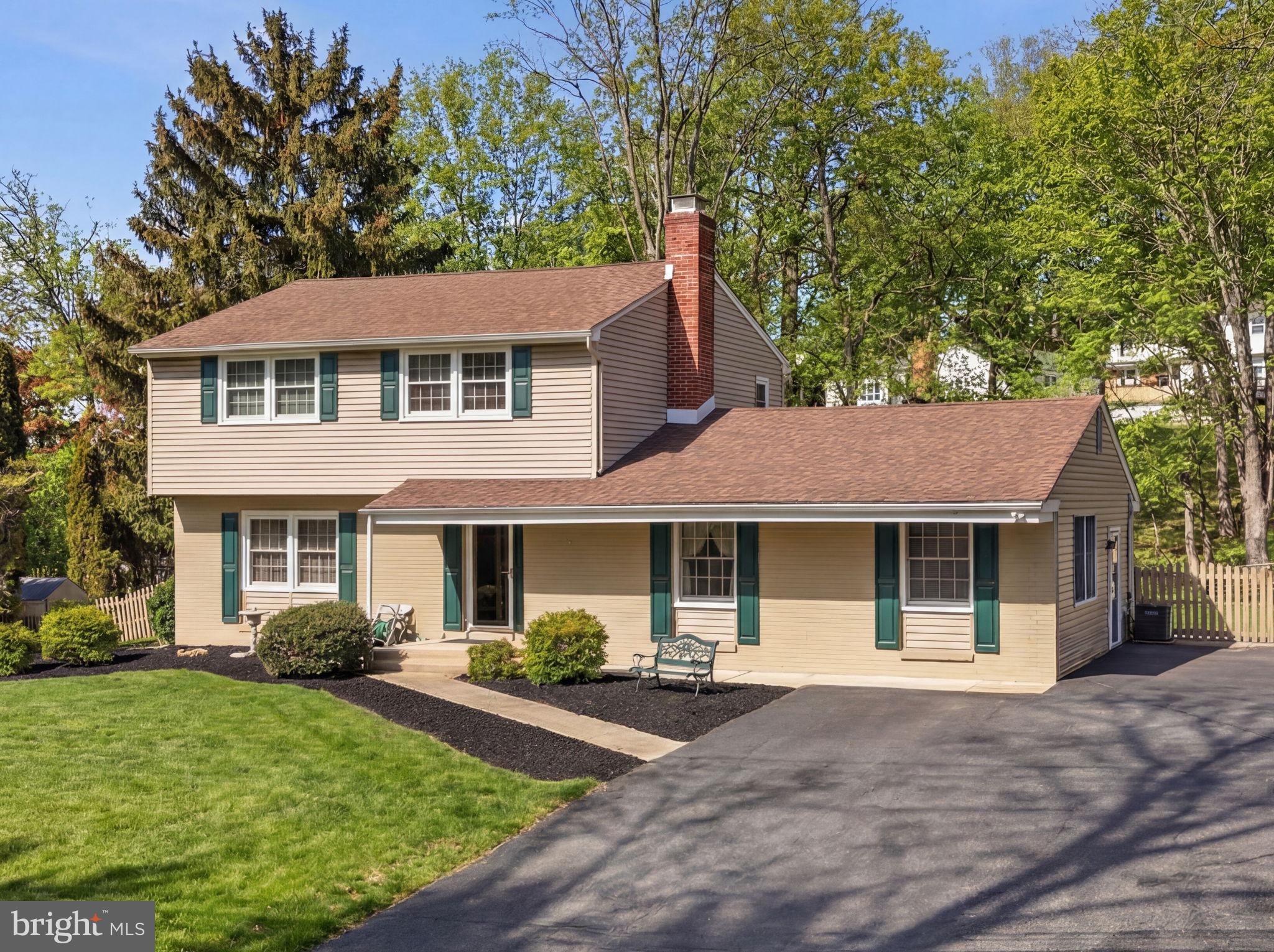 1848 Brackenville Road Hockessin, DE 19707 - Photo 2 of 37 a front view of a house with a garden