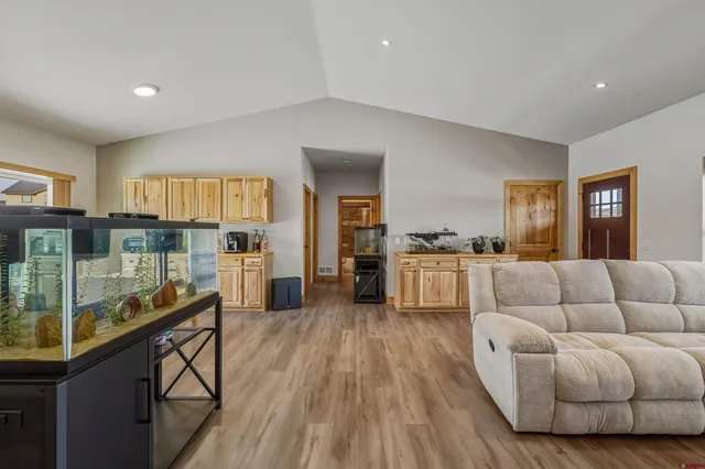 a view of a livingroom with a washer and dryer