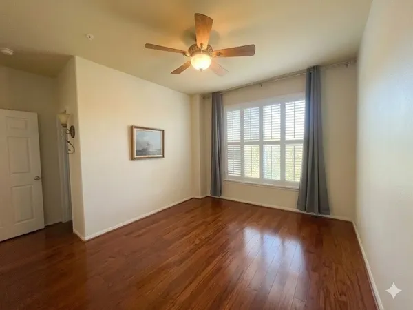 a bathroom with a double vanity sink a mirror and a shower