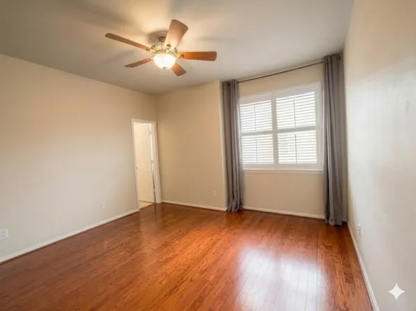 a bathroom with a bathtub shower sink vanity and toilet