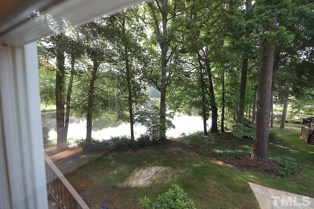 7600 Pinewild Court Raleigh, NC 27615 - Photo 26 of 52 a view of a trees in a yard