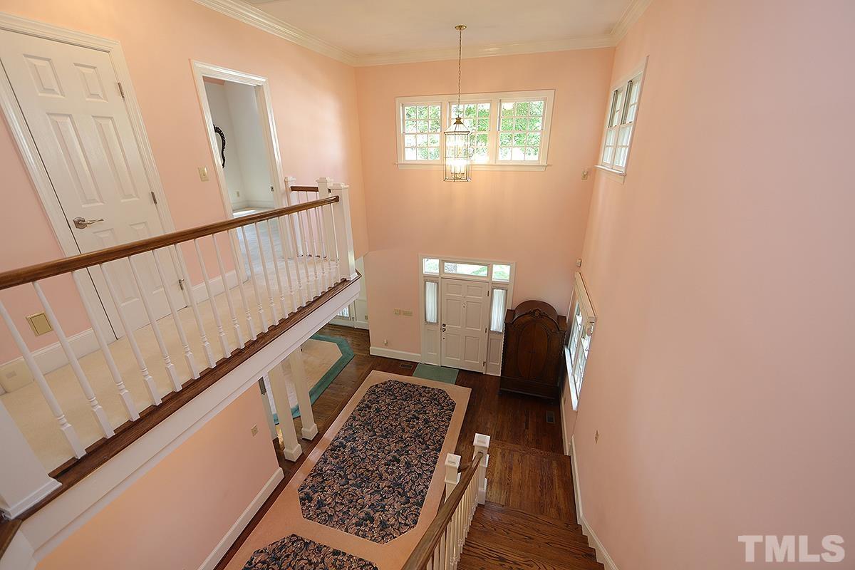 7600 Pinewild Court Raleigh, NC 27615 - Photo 27 of 52 a view of entryway with wooden floor